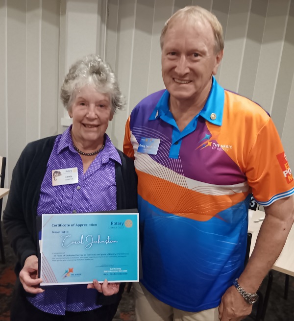 Carol Johnston receives 25 Year service from AG Greg Lee-Archer
